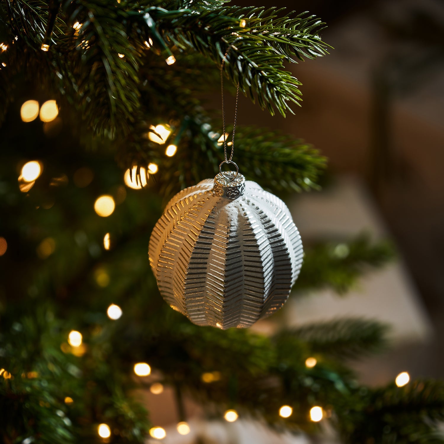 Distressed Textured Bauble by Sophie Allport hung on Christmas tree