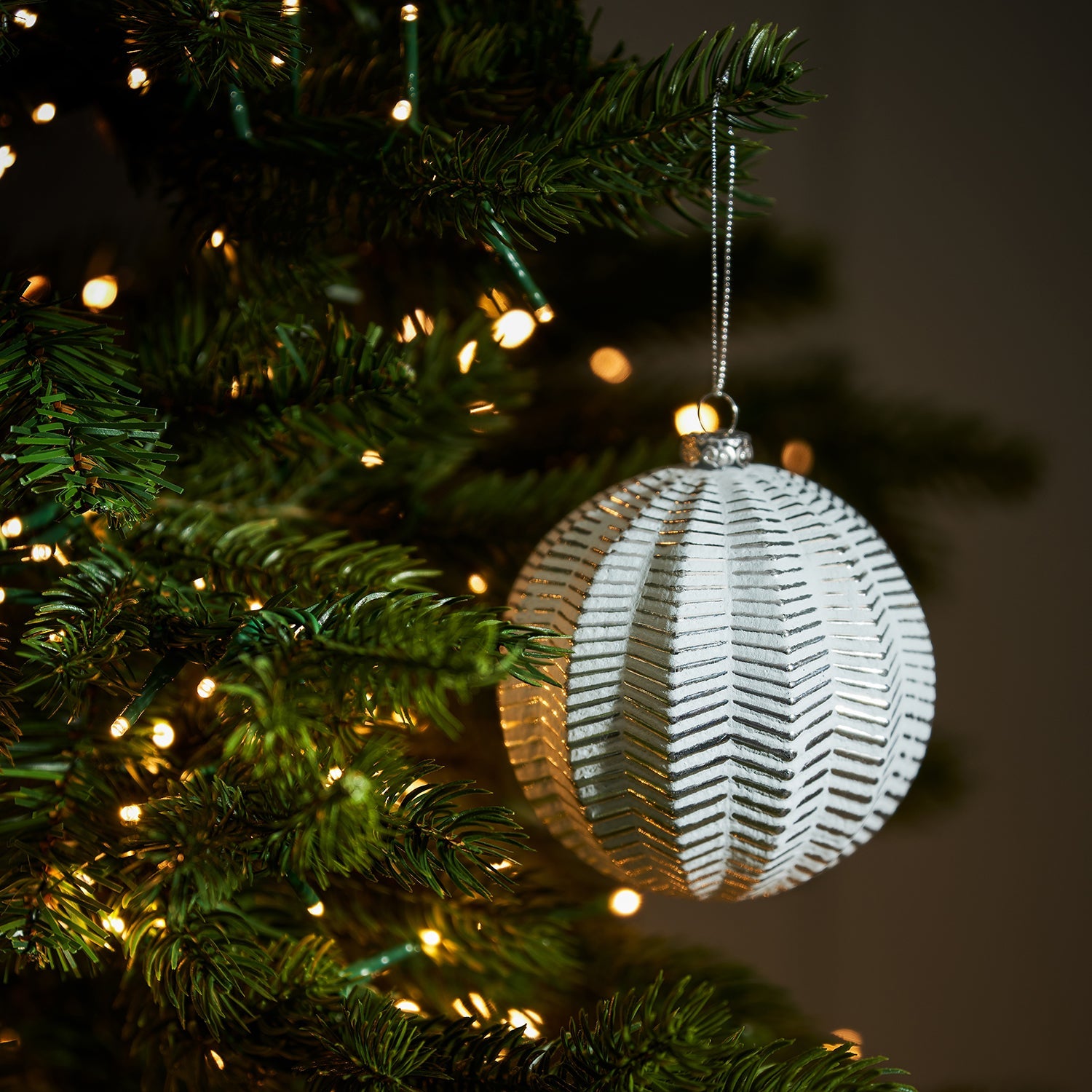 Distressed Textured Bauble by Sophie Allport, hung on Christmas tree