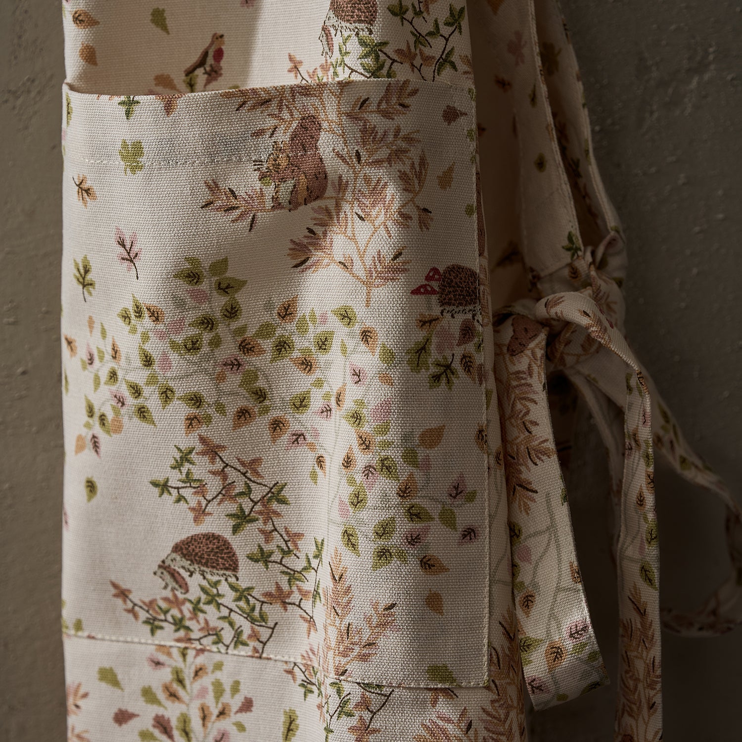 Close up of Sophie Allport's Woodland Friends print on her adult Apron