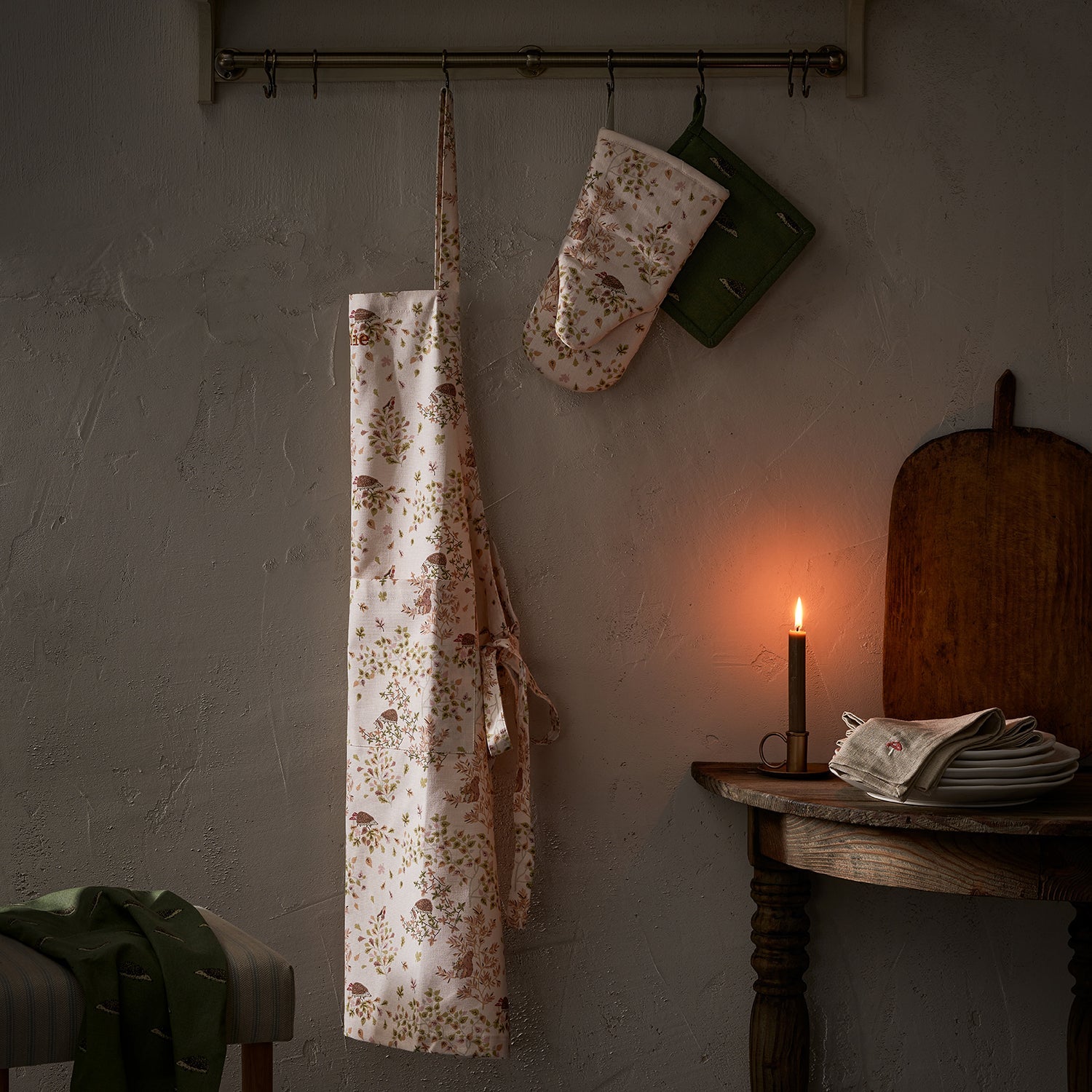 Sophie Allport's Woodland Friends Adult Apron hanging up 