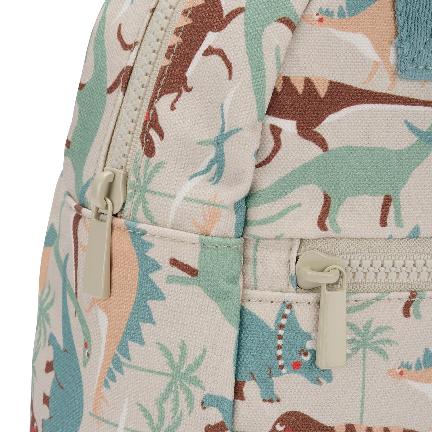 Dinosaur Camouflage Backpack by Sophie Allport, close up of zip