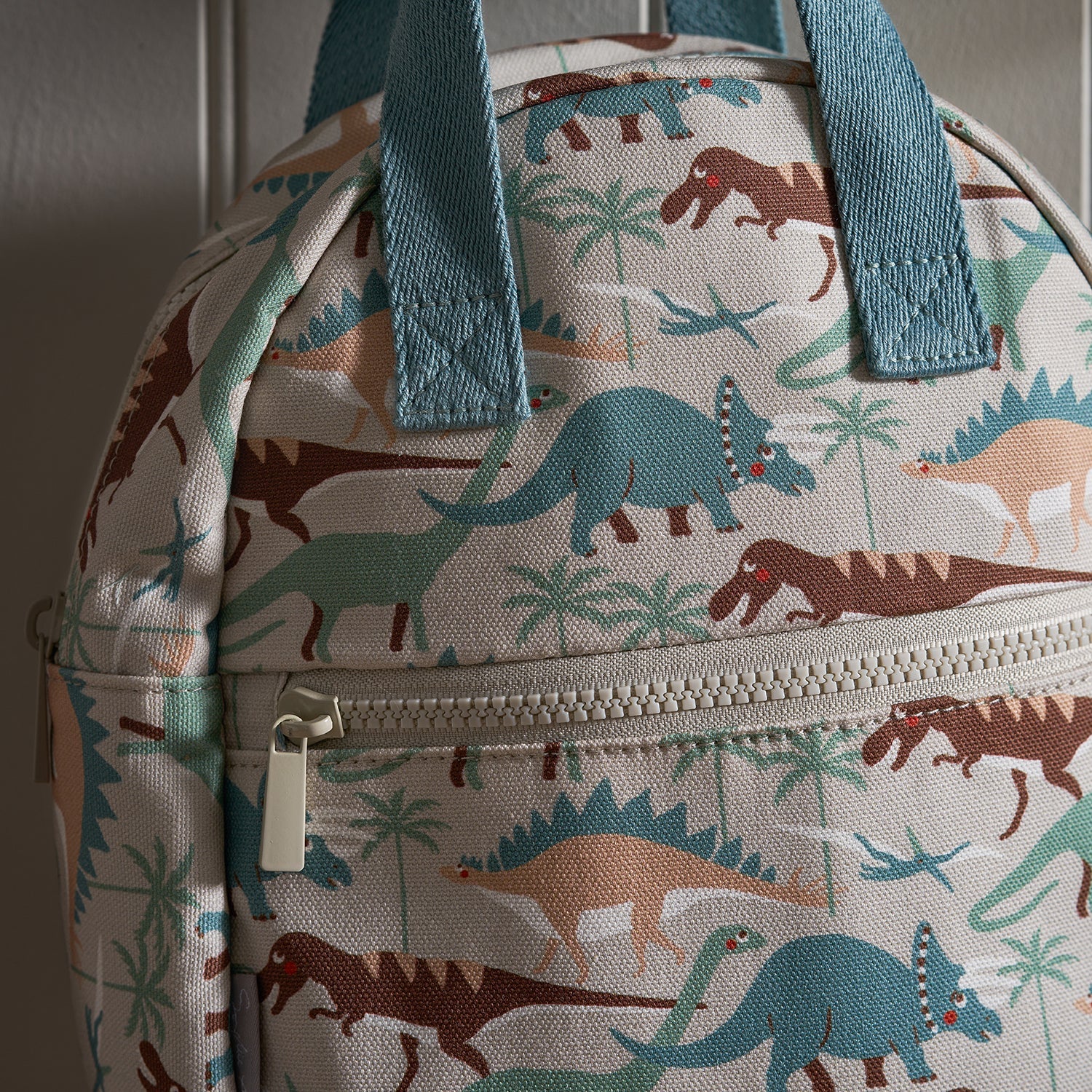 Close up of Sophie Allport's Dinosaur Camouflage Backpack 