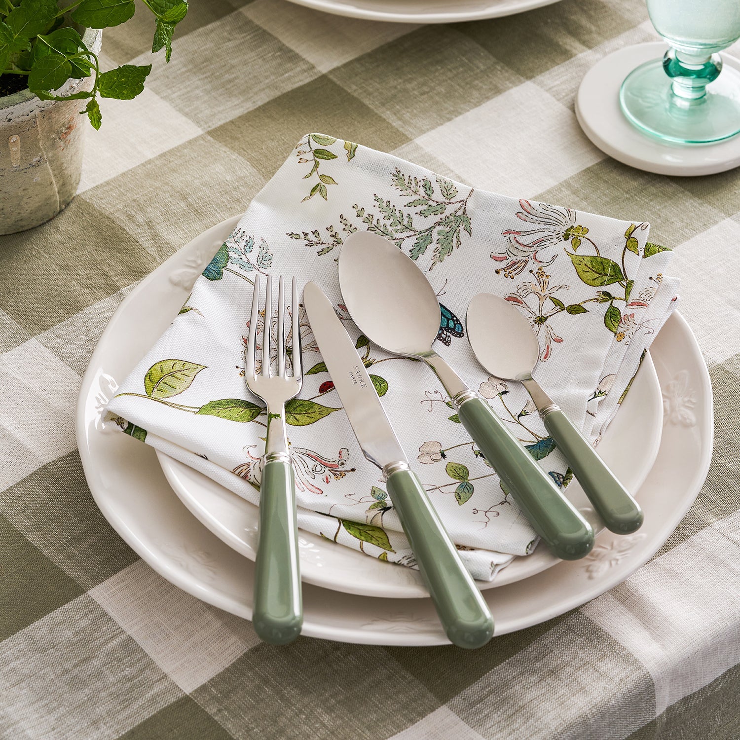 Stainless steel cutlery set with green handles by Sophie Allport