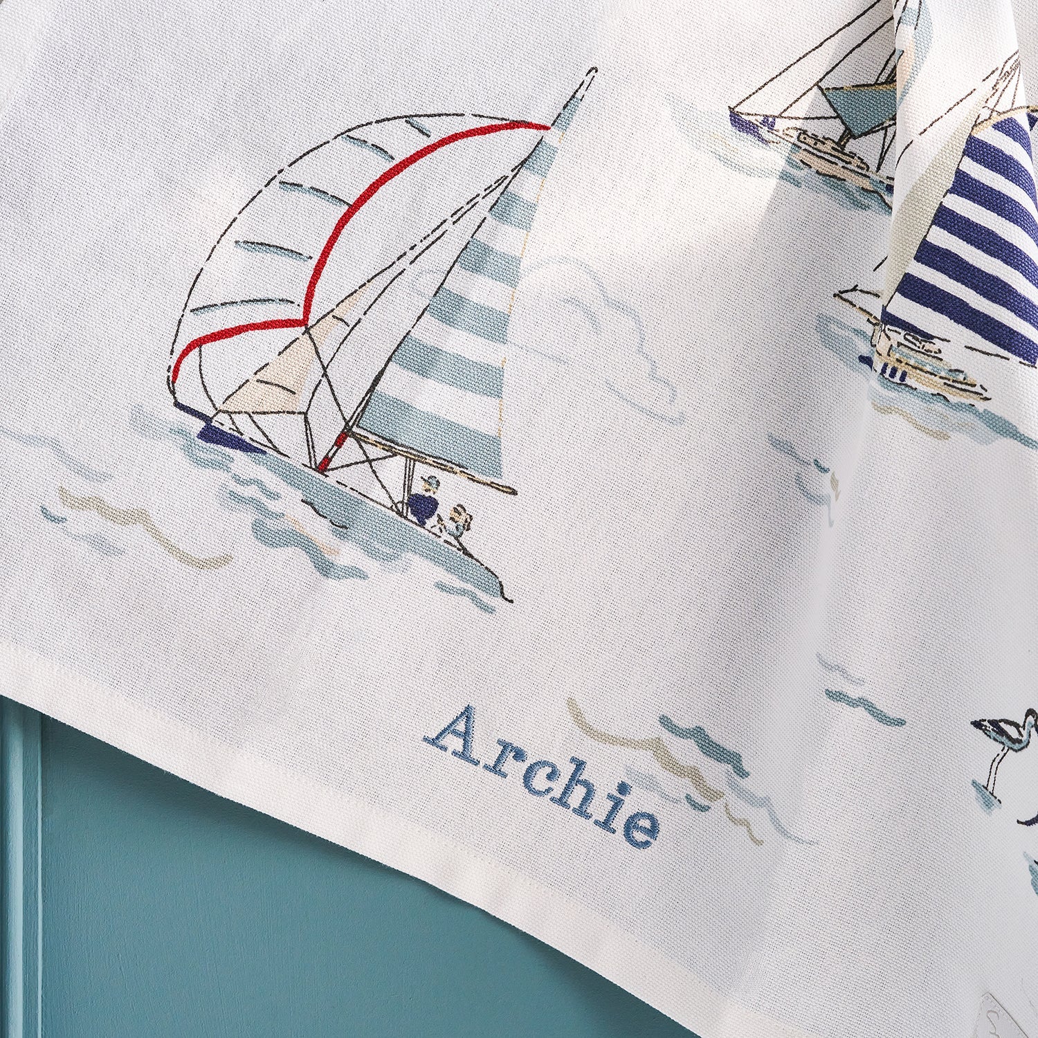 White tea towel with coastal sailing boats by Sophie Allport personalised