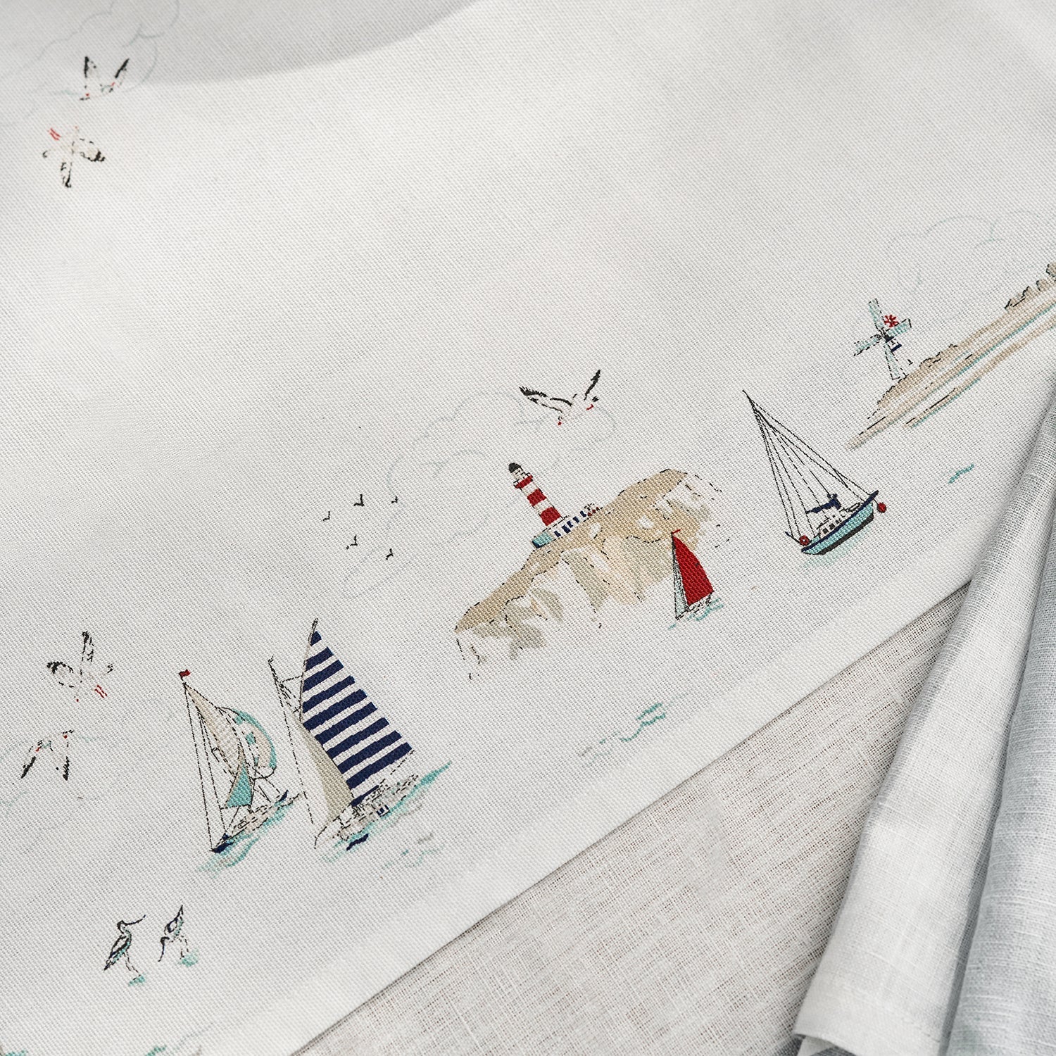 White table runner with coastal sailing boats print by Sophie Allport detail