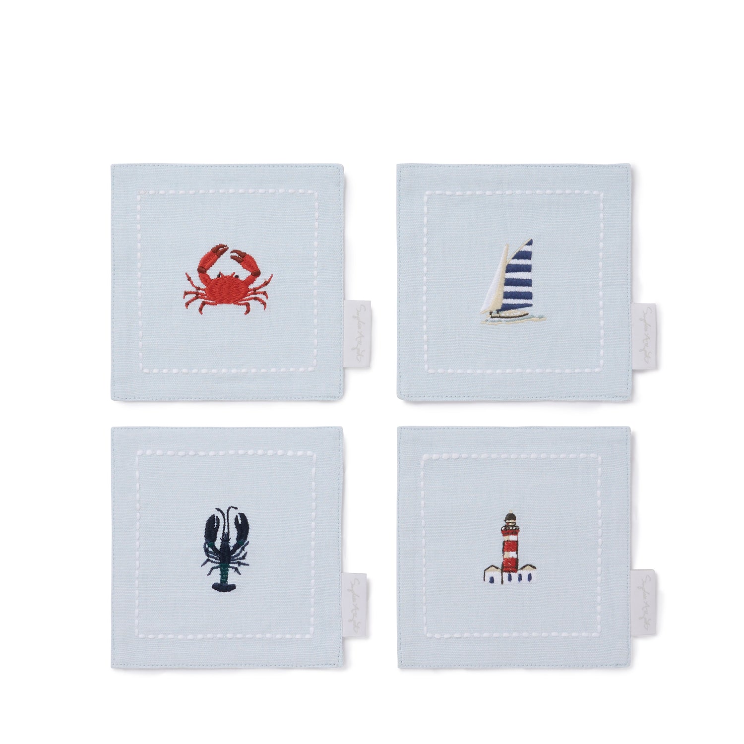 Blue drinks coasters with coastal prints by Sophie Allport set of 4