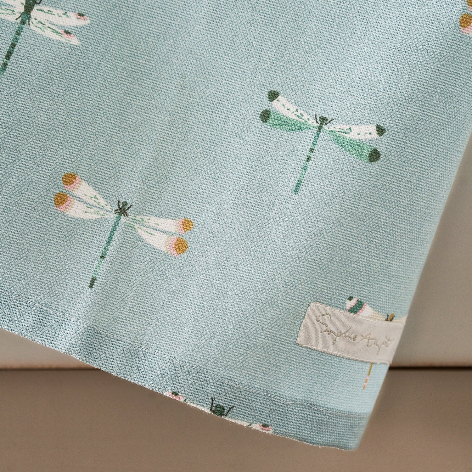 Blue tea towel with dragonfly print by Sophie Allport detail