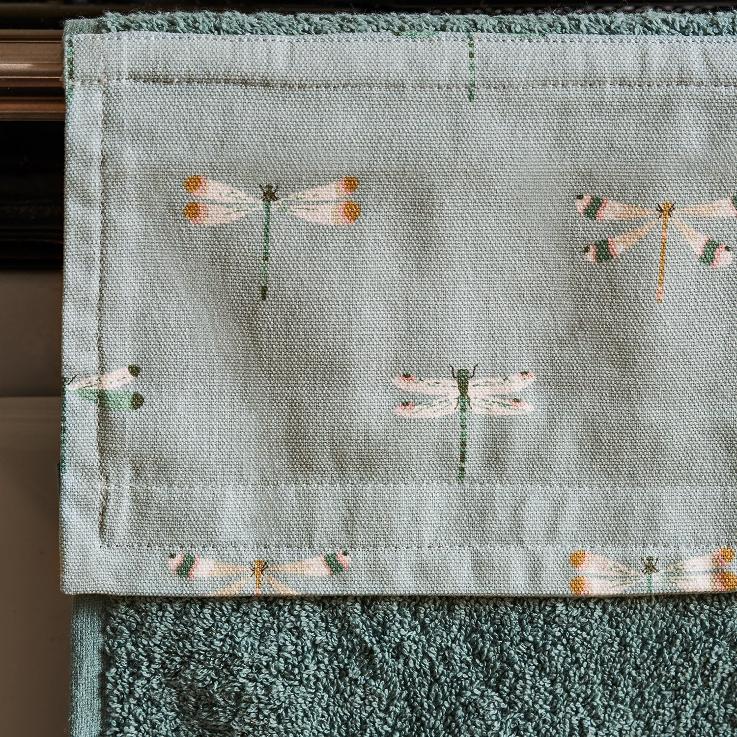 Blue roller hand towel with dragonfly print by Sophie Allport detail