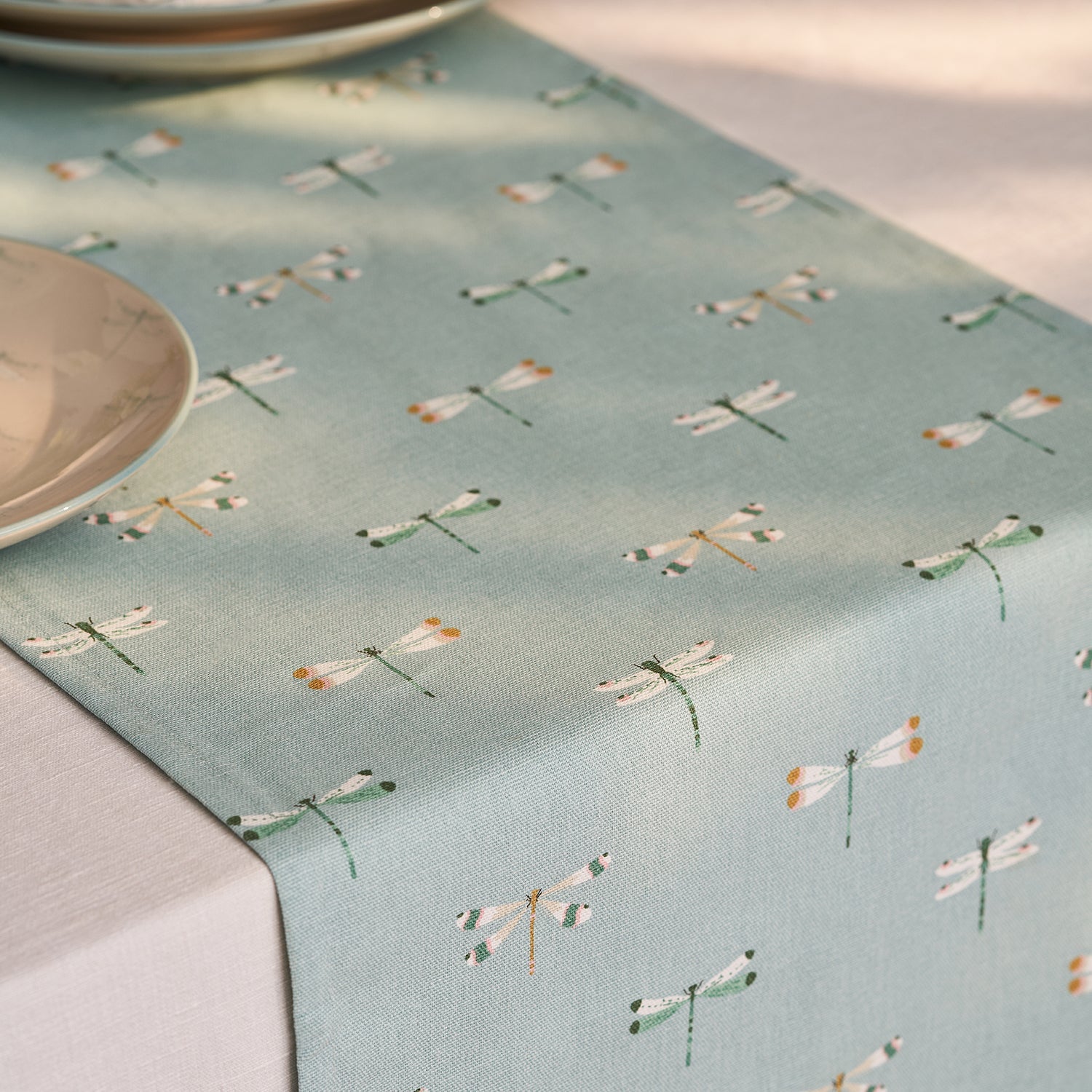 Blue table runner with dragonfly print by Sophie Allport detail