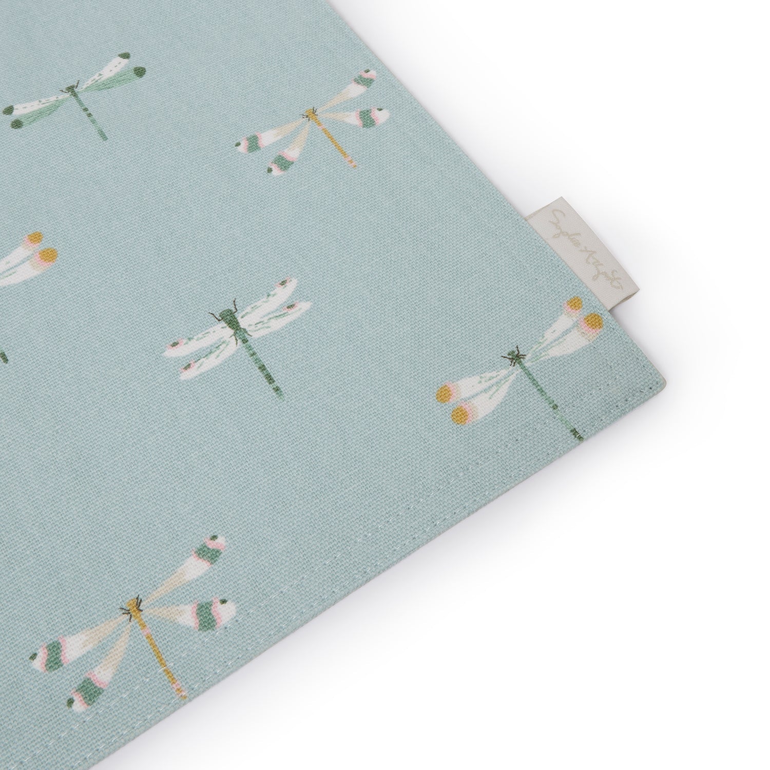 Blue fabric placemats with dragonfly print by Sophie Allport tag detail