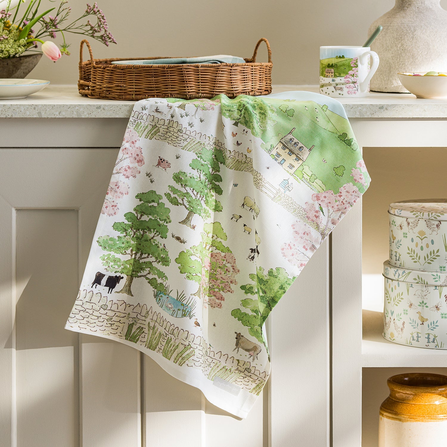 White tea towel with Easter spring cottage print by Sophie Allport