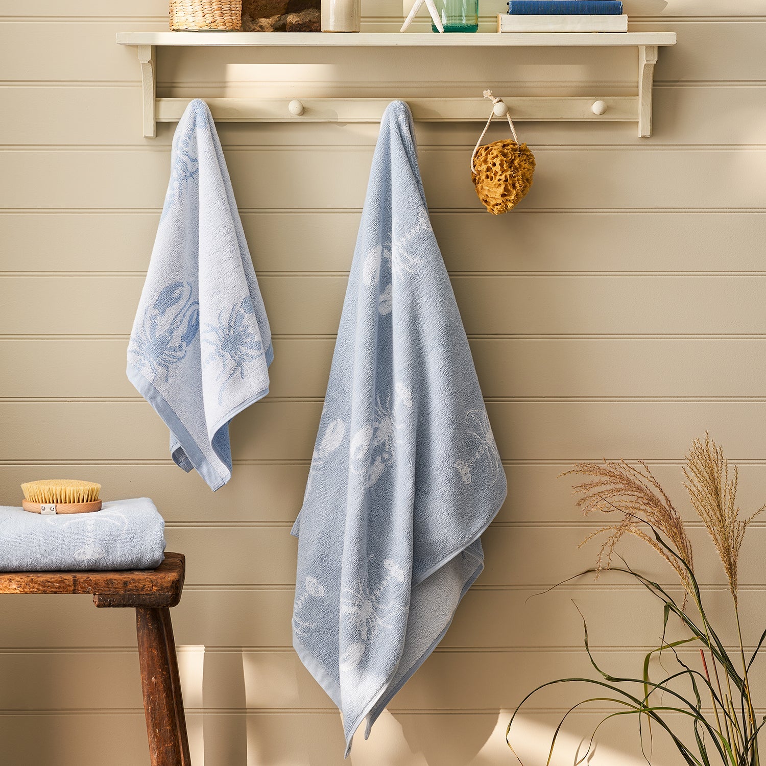 Blue lobster print bathroom towels by Sophie Allport 