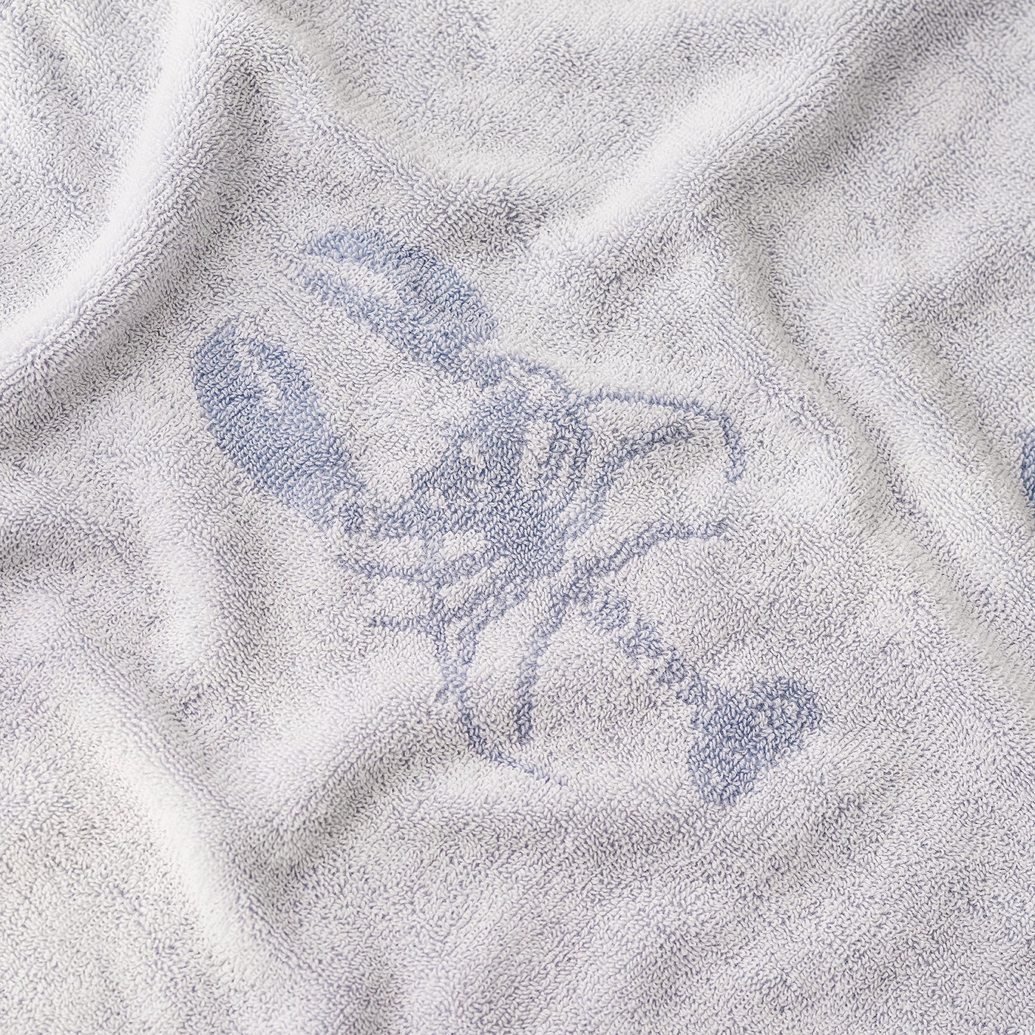 Blue lobster print bathroom towels by Sophie Allport bath sheet reverse detail