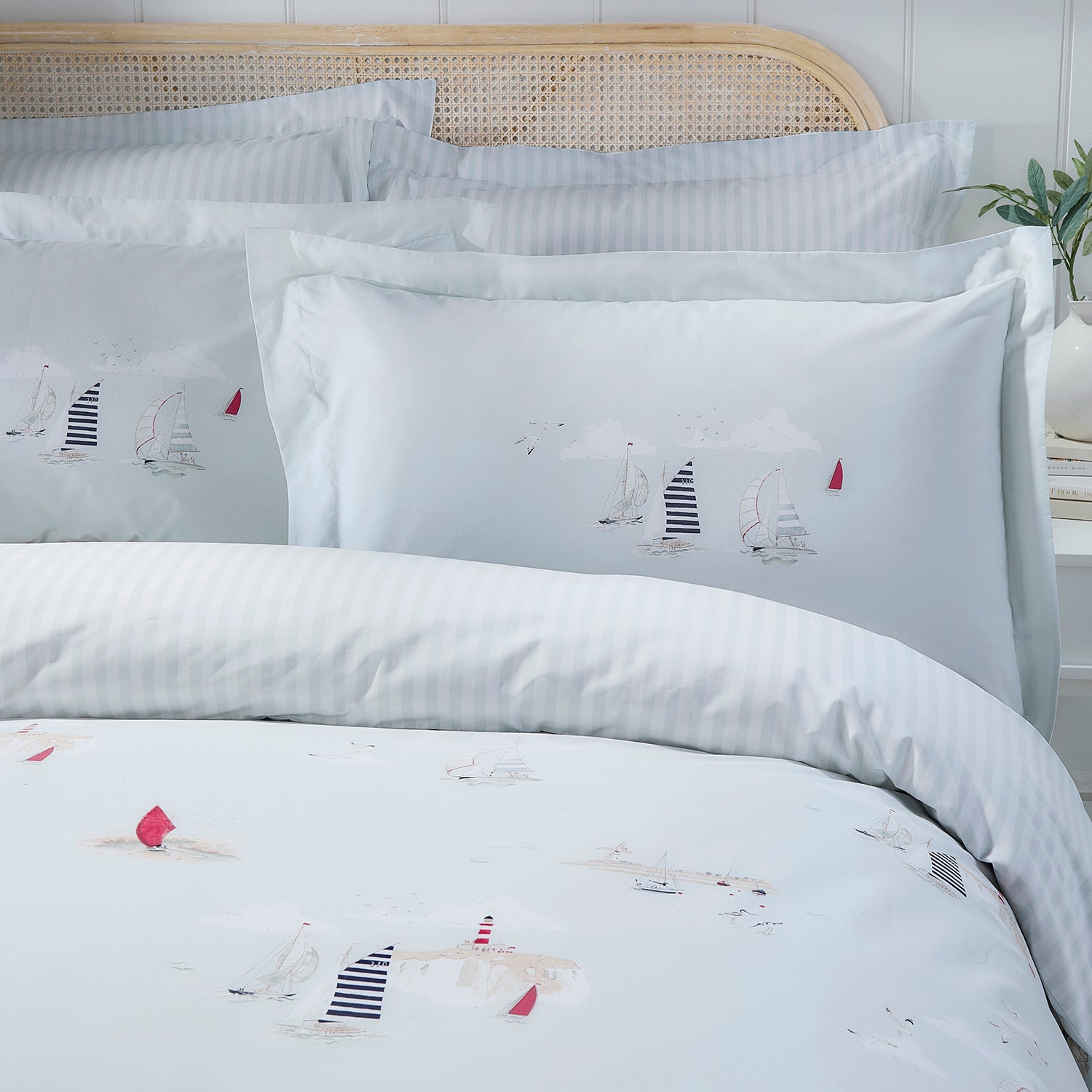 Blue cotton bedding set with coastal print by Sophie Allport reverse detail