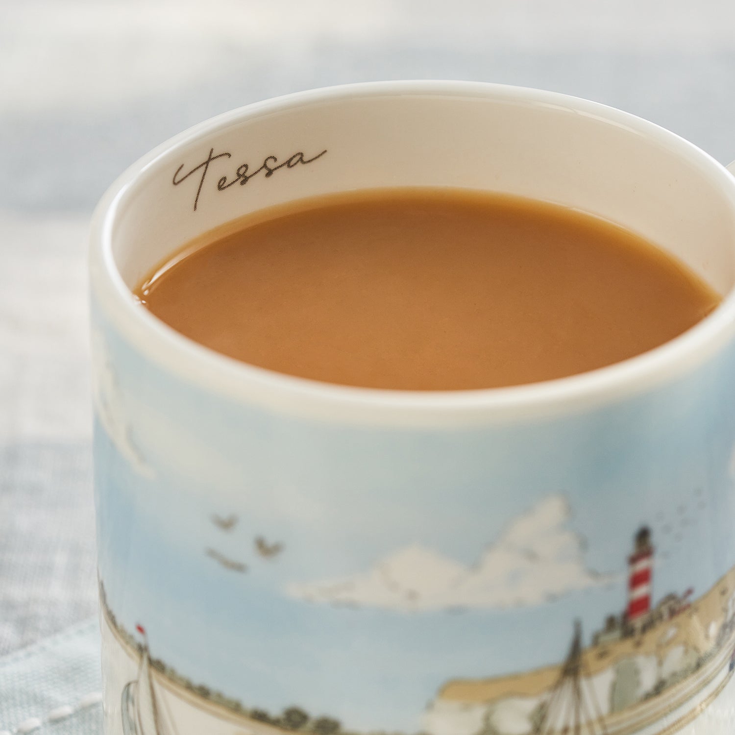 Fine bone china mugs with coastal sailing boats print by Sophie Allport personalised detail