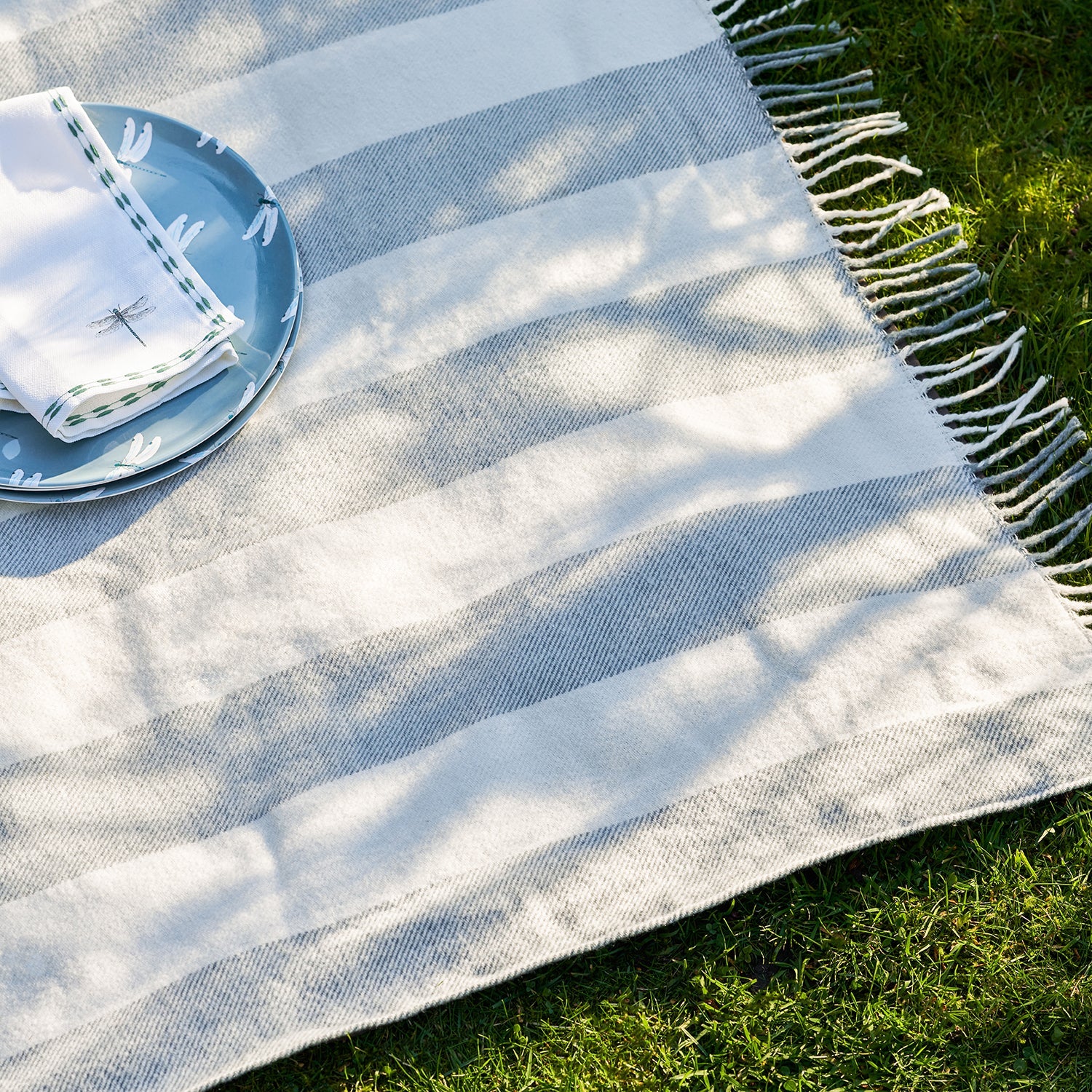 Blue and white stripe woven picnic blanket by Sophie Allport detail