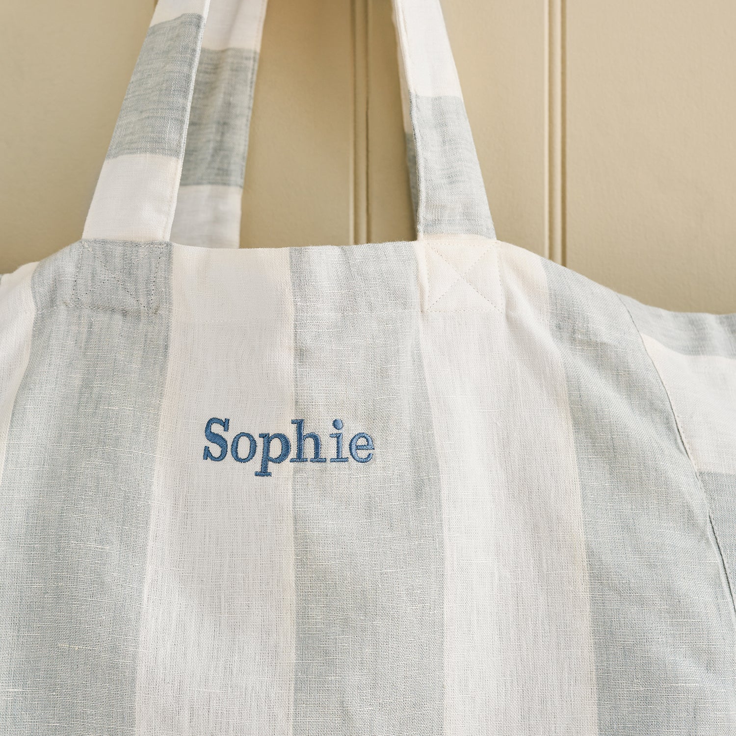 Blue and white stripe linen bag with lobster print by Sophie Allport personalised