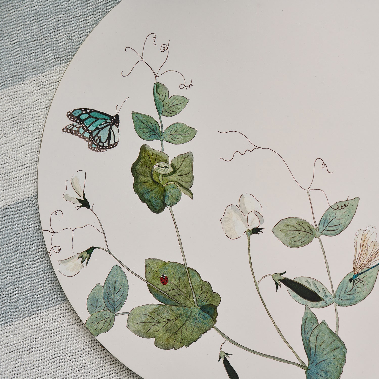 Round placemat with floral print by Sophie Allport detail