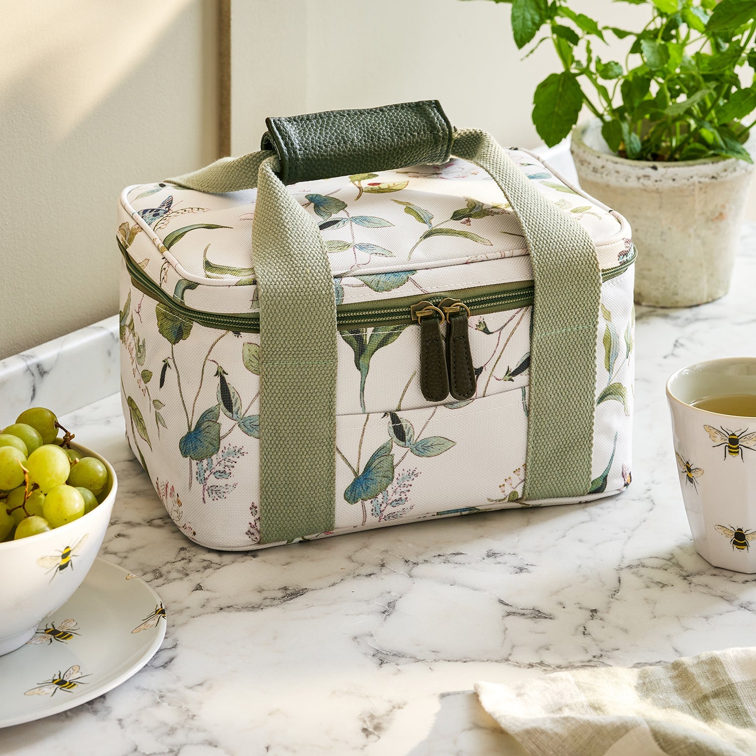 White lunch bag with floral print by Sophie Allport