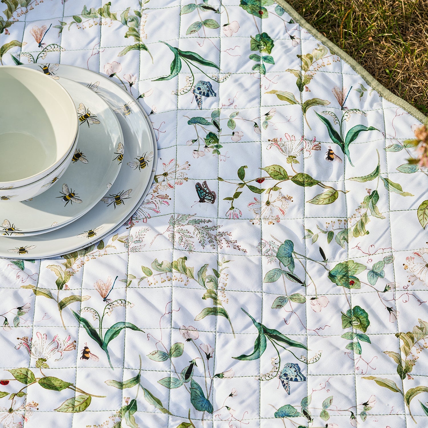 White picnic blanket with floral print by Sophie Allport detail