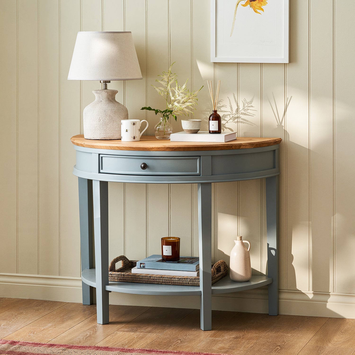 Blue halfmoon console table with oak top by Sophie Allport