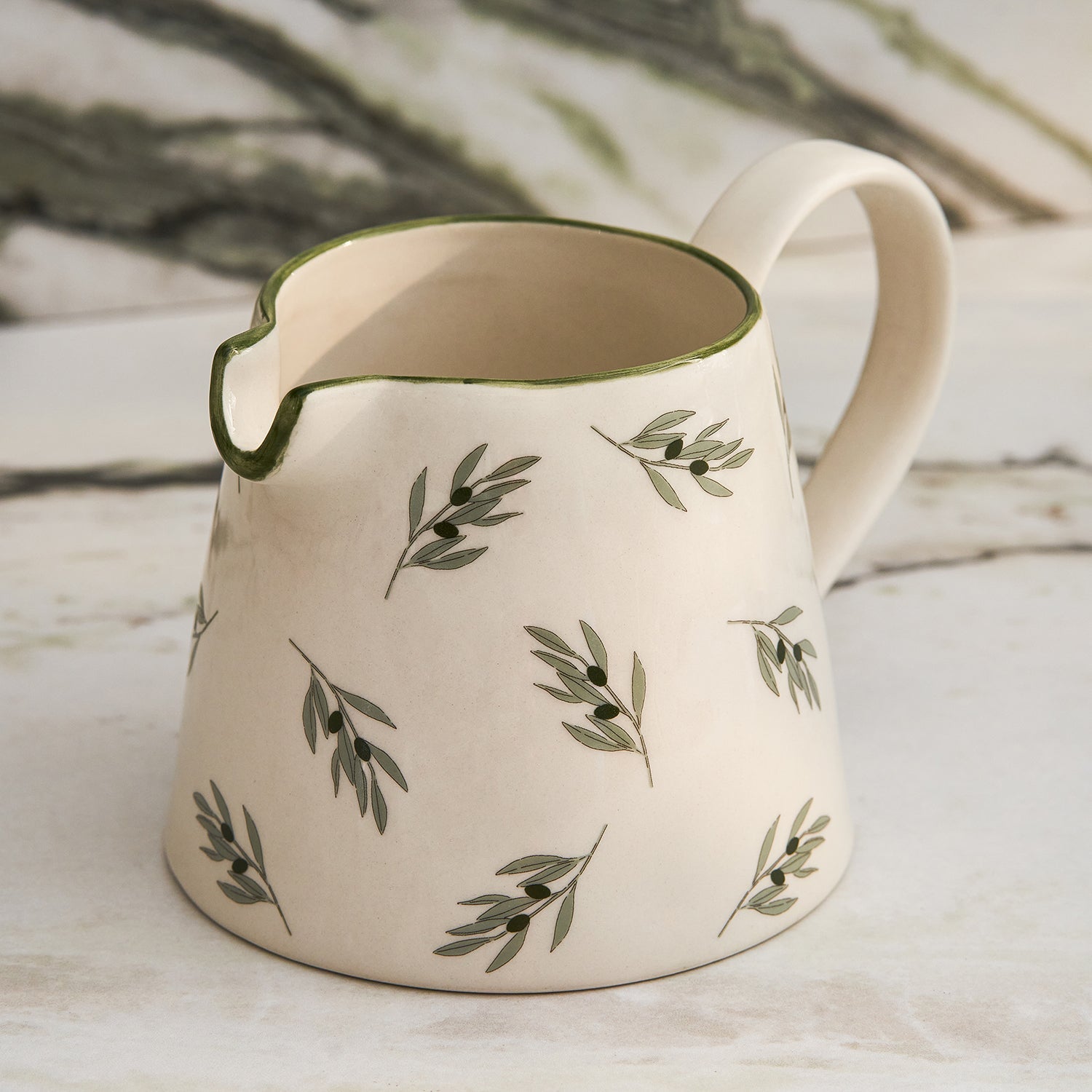 Stoneware jug with olive print by Sophie Allport detail