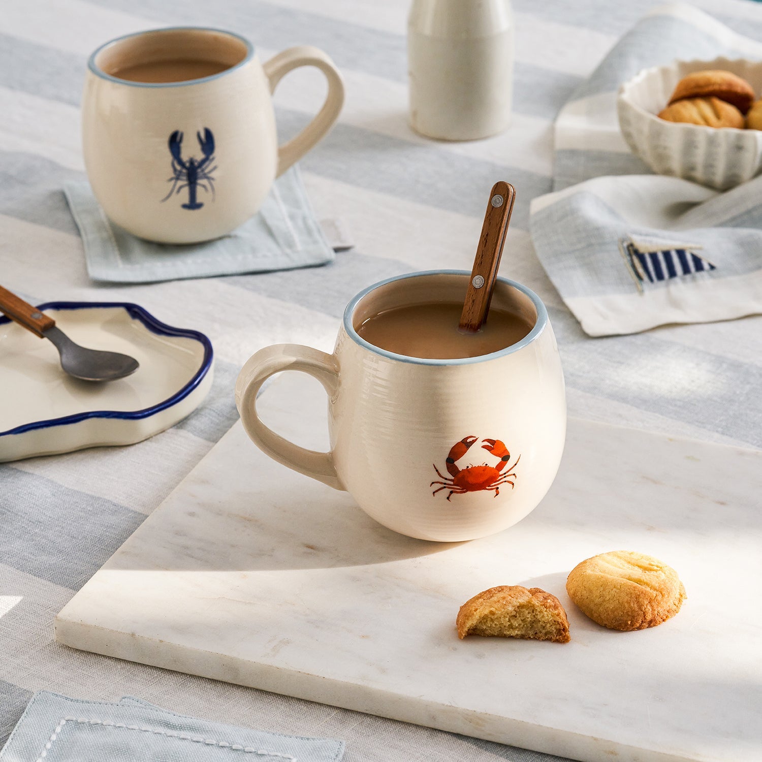 Stoneware mugs with lobster and crab print by Sophie Allport