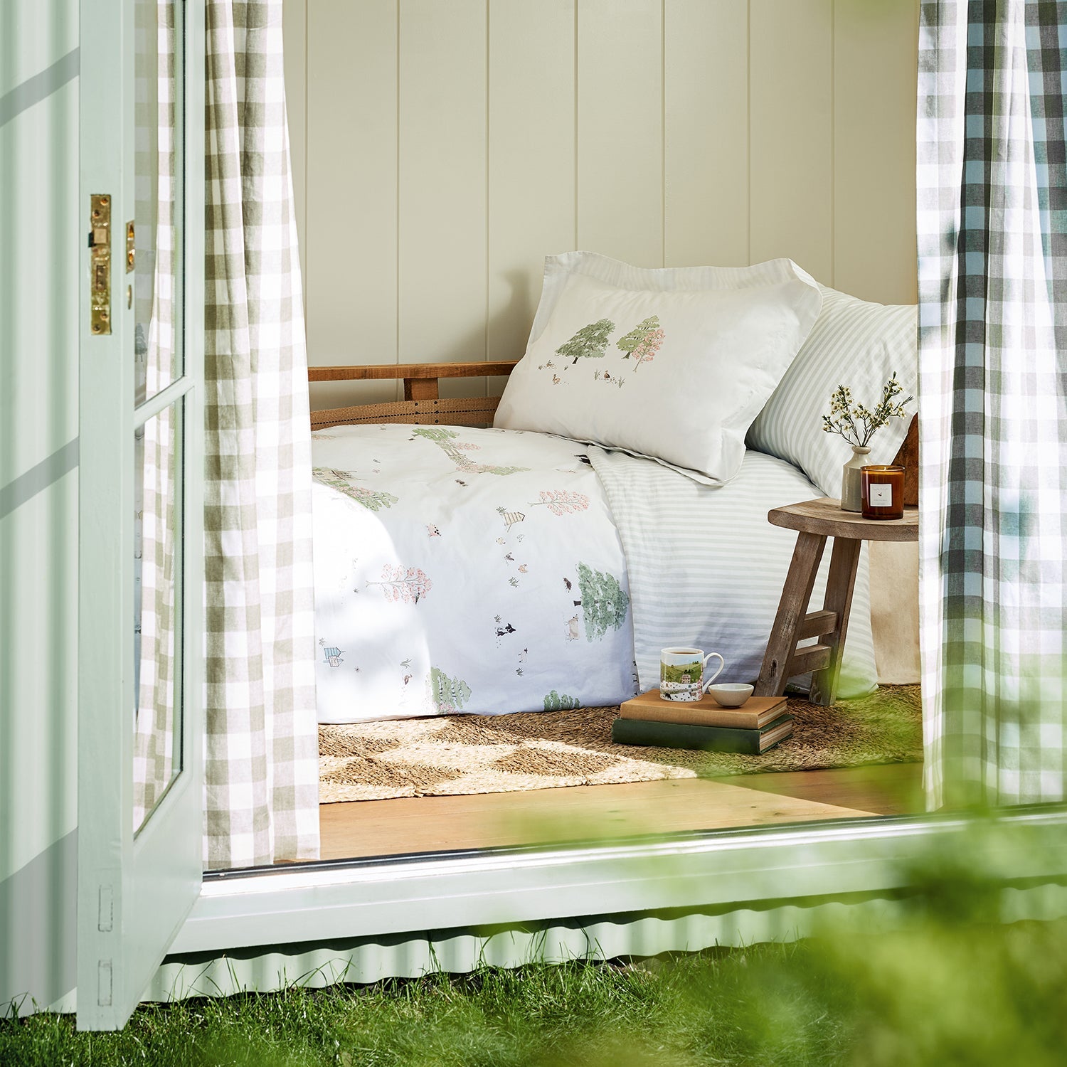 White cotton bedding set with spring cottage print by Sophie Allport