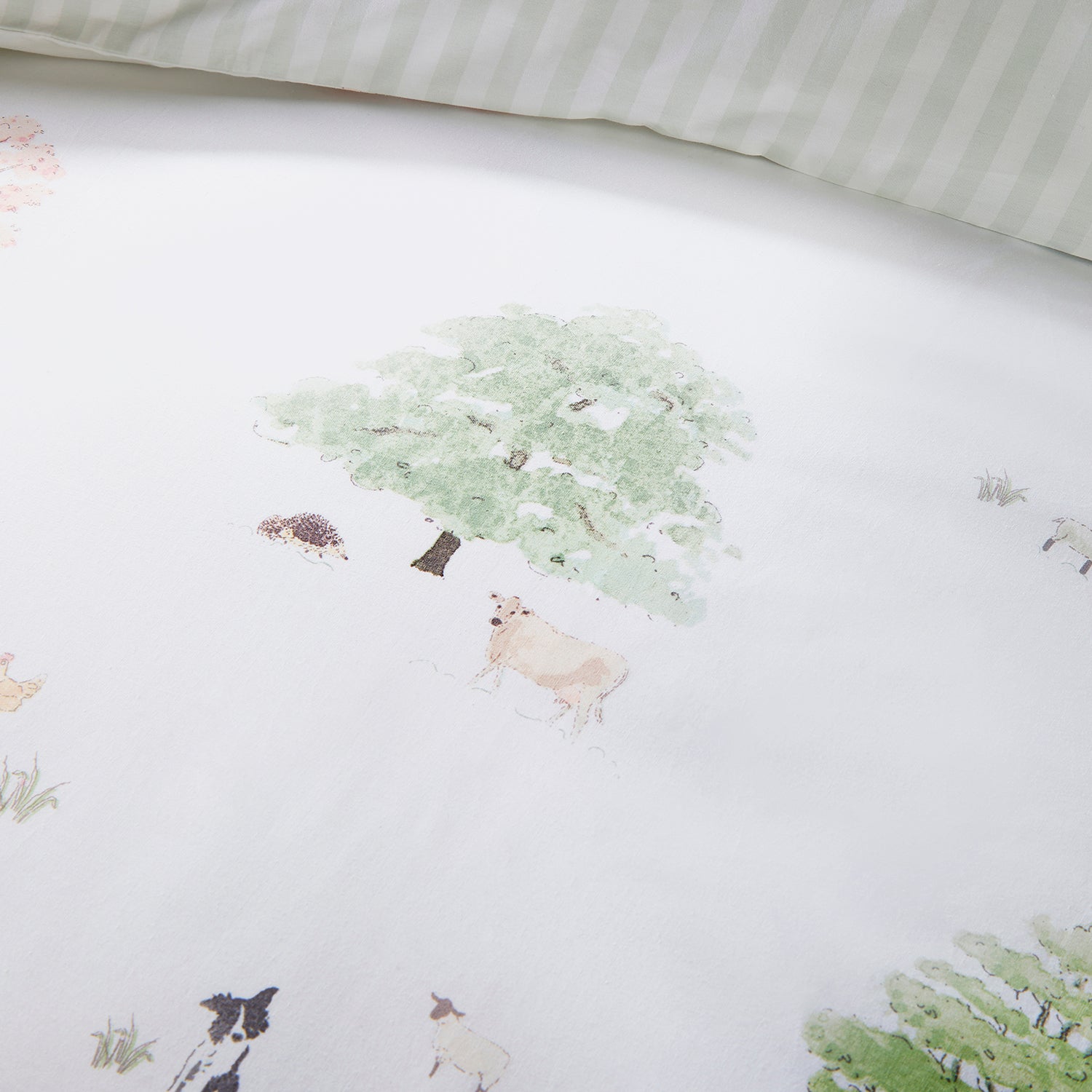 White cotton bedding set with spring cottage print by Sophie Allport tree detail