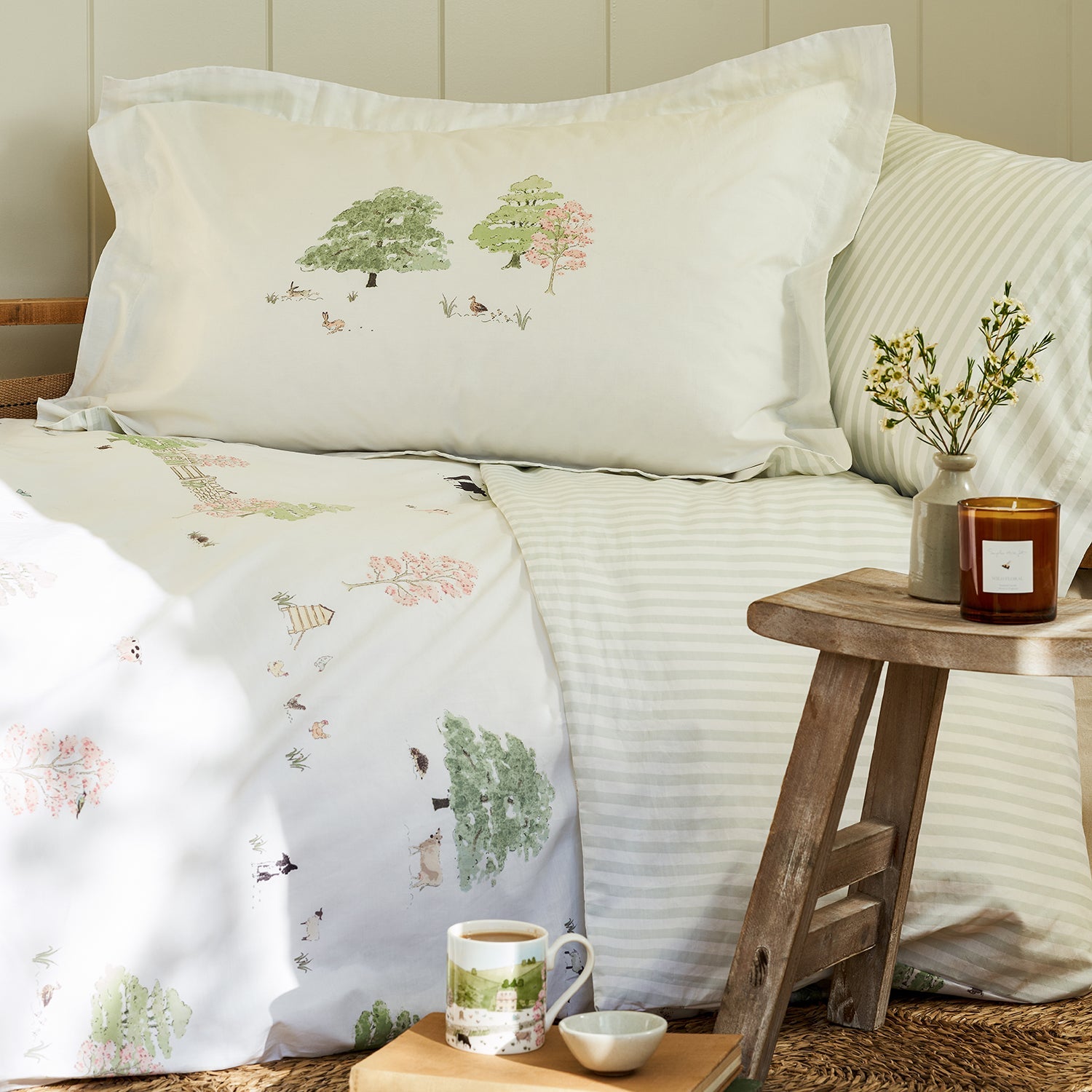 White cotton bedding set with spring cottage print by Sophie Allport pillow detail