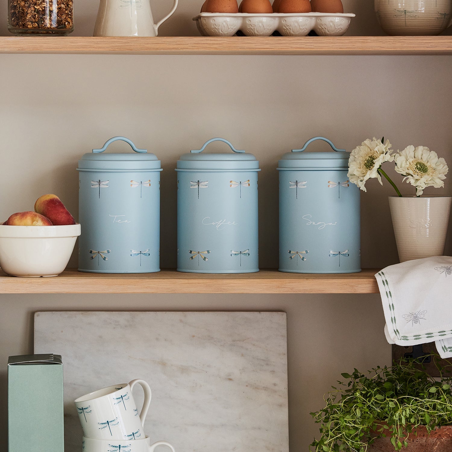 Set of 3 blue storage canisters with by Sophie Allport