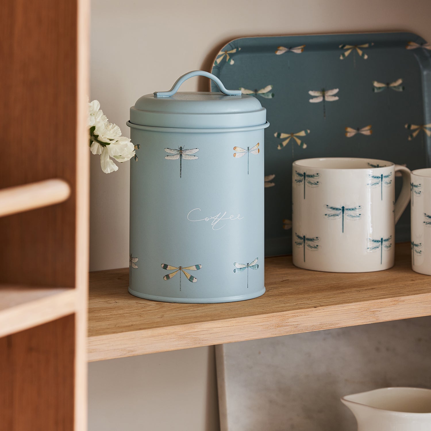 Blue coffee canister with dragonfly print by Sophie Allport