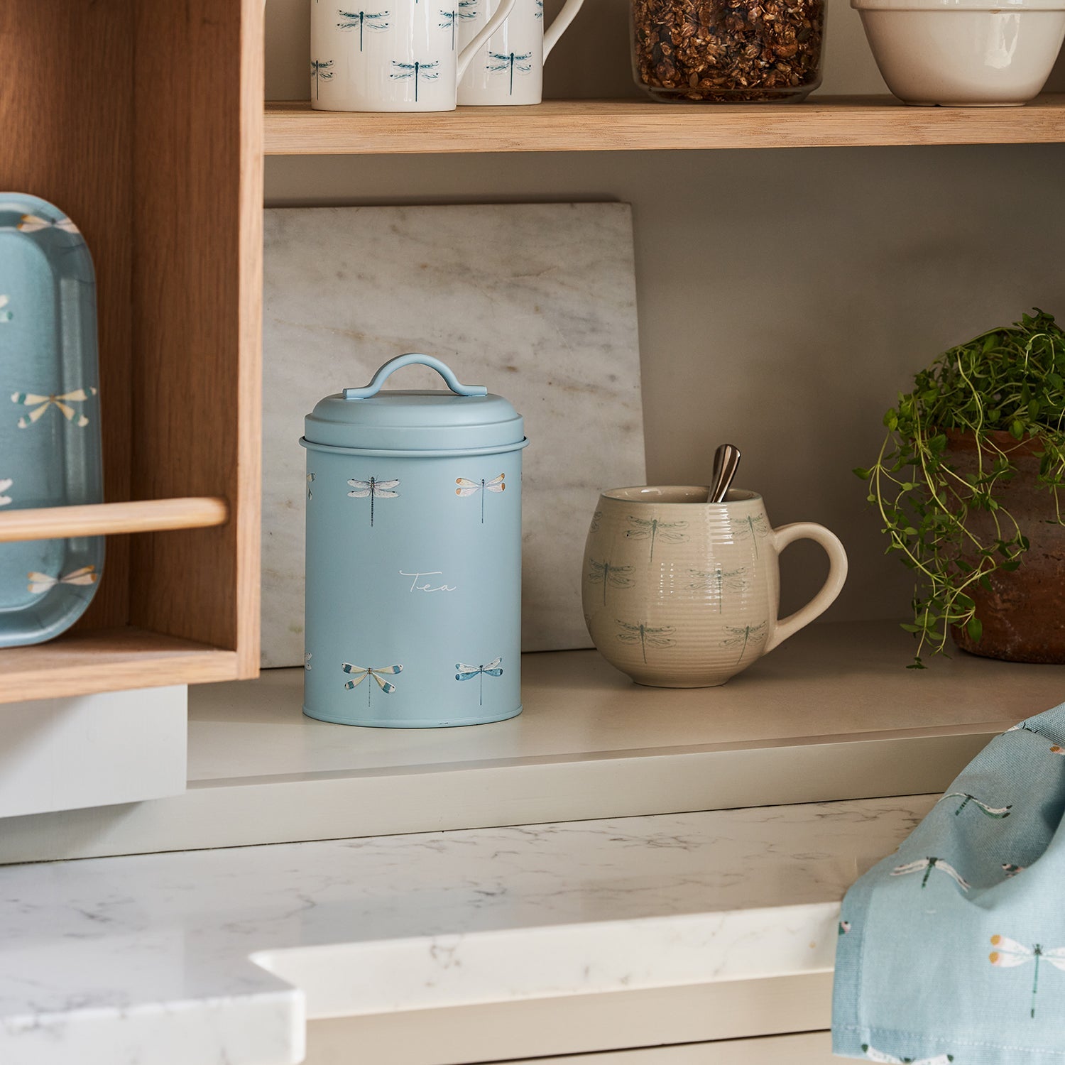 Blue tea canister with dragonfly print by Sophie Allport