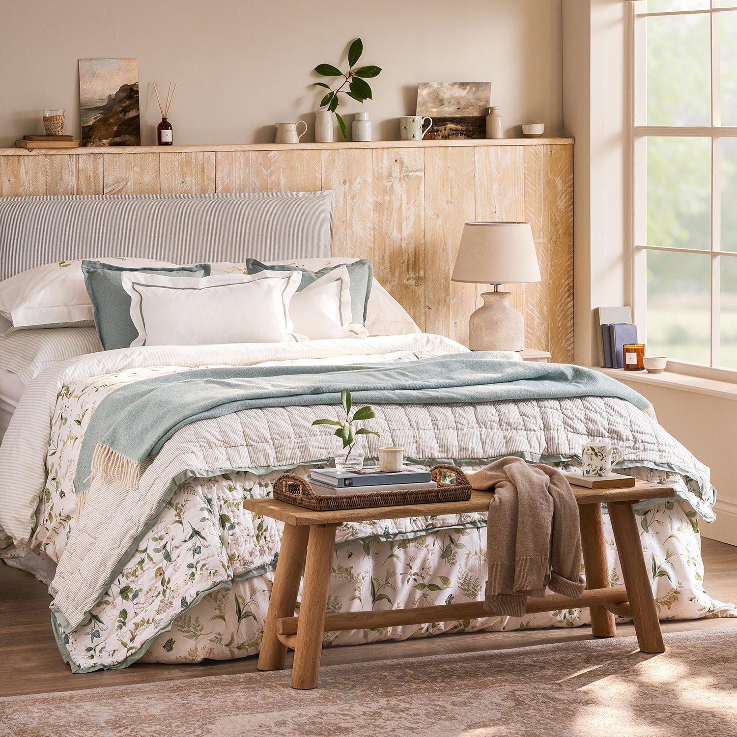 White cotton bedding set with floral print by Sophie Allport